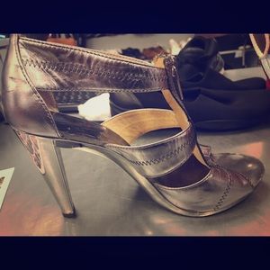 Michael Kors silver pumps